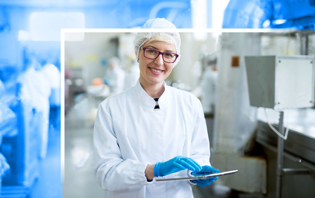 Young woman in sterile clothing with tablet